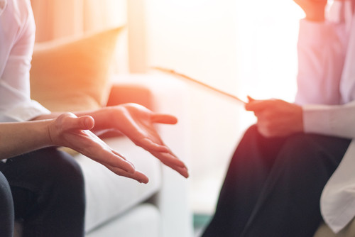 A licensed therapist is providing ketamine assisted therapy