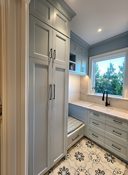 Blue painted custom laundry room combining style and function, Naples.