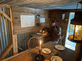 Officer inside a ww1 dug out