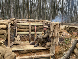 Soldier resting in the trench.