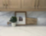 Tying the kitchen cabinets and countertops together with warm accents.