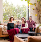Family picture on living room couch.