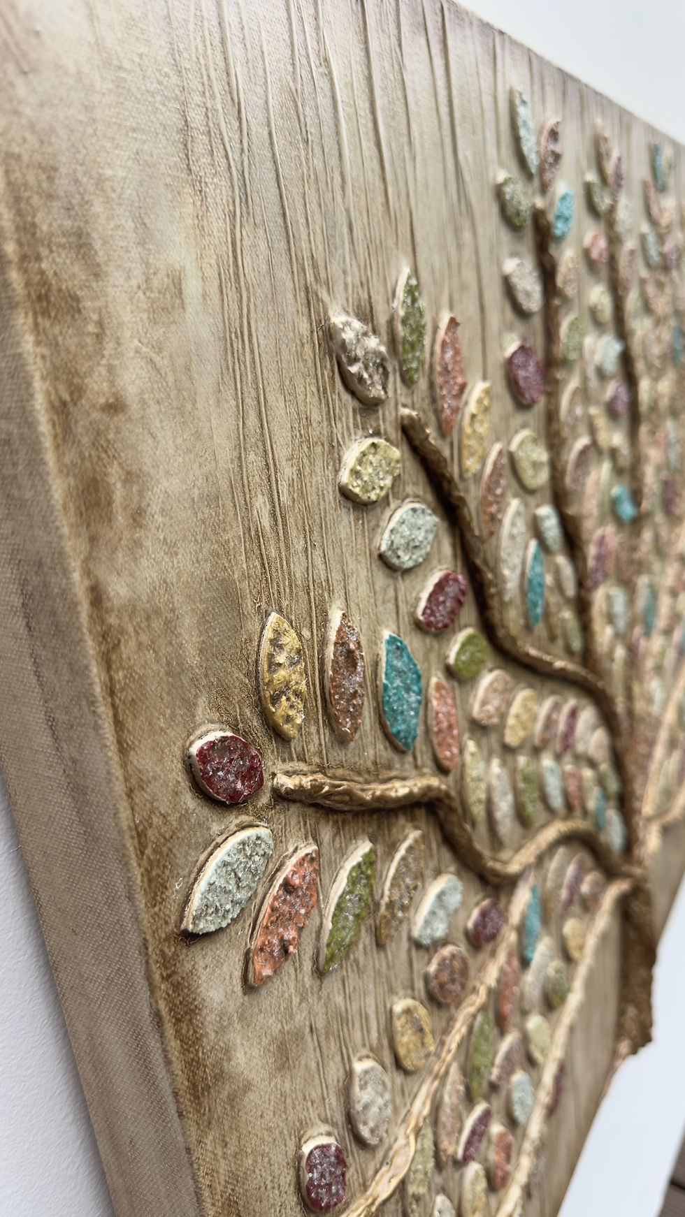 Thumbnail: A colorful dimensional tree painting with lots of sparkling leaves and raised trunk and branches gilded in gold