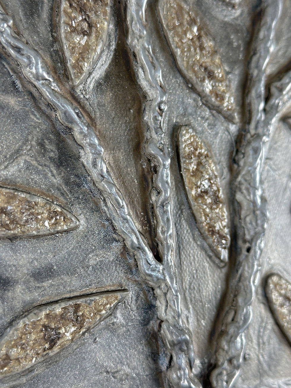 Thumbnail: A skinny and tall textured olive tree painting with crushed glass leaves in neutral colors.