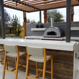 Outdoor kitchen with seating
