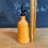 Thumbnail: Oil dispenser - Orange with stripes.