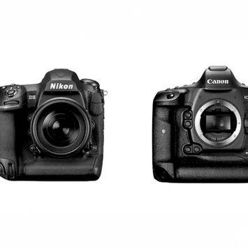 Two professional cameras, Nikon D5 with a lens and Canon EOS-1D X Mark II without a lens, against a white background.