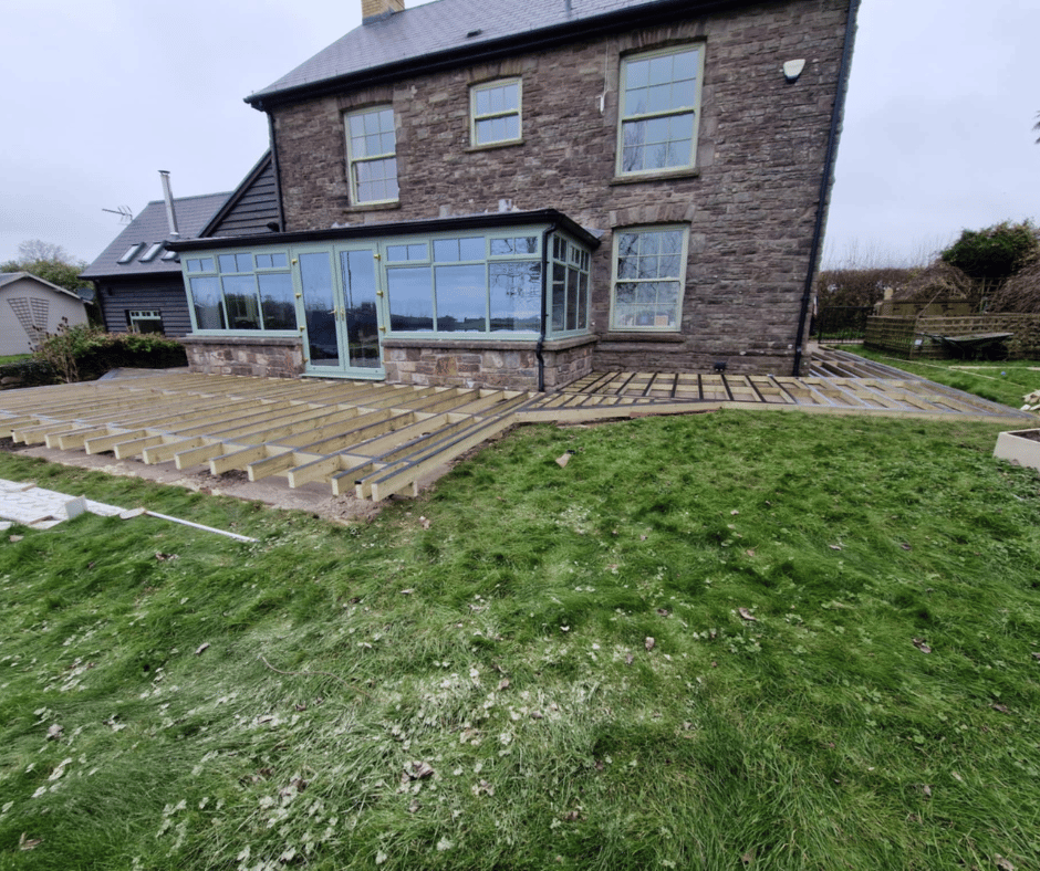 Trex composite decking subframe installation showing joist spacing before boards are fitted, South Wales
