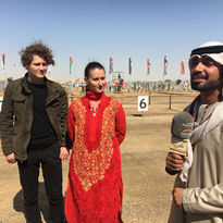 Jo and Karen Ellis being interviewed for U.A.E Television at a private camel festival celebrating camel beauty.