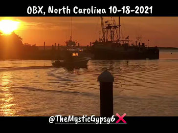 Fishing boat in OBX heading out to sea at sunrise