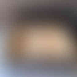 Custom cabinetry drawer open inside 1988 Ford Econoline campervan.