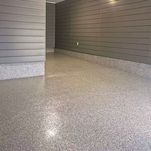 Newly installed decorative quartz epoxy flooring in a commercial building in Toronto, providing durability and a polished finish.