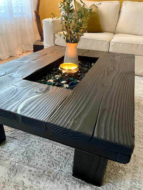 Thumbnail: Lightweight farmhouse coffee table with a dark rustic wood tone from wood-burning.
