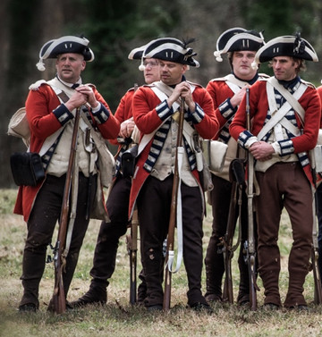 Soldiers of the 7th Regiment of Foot await orders at the Battle of Guilford Courthouse Reenactment