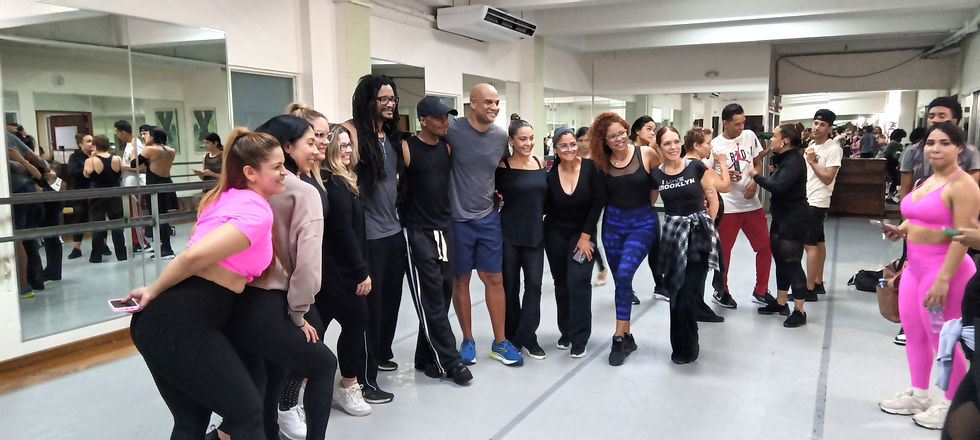 Eye-level view of a dancer practicing energetic movements during class