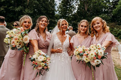Soft Pink Bridesmaids Dresses with Mixed Pastel Bouquets