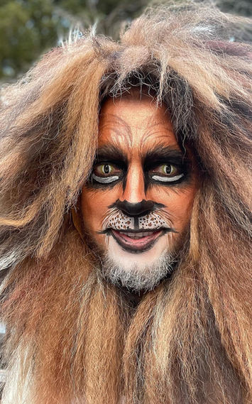 Man with lion face painting design for Halloween costume in San Francisco