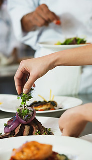 Chef Garnishing a Meal