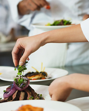 Chef Garnishing a Meal