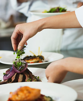 Chef Garnishing a Meal