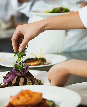 Chef Garnishing a Meal