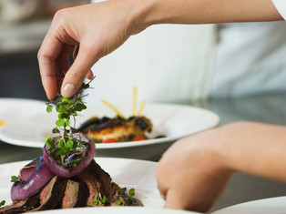 Chef Garnishing a Meal