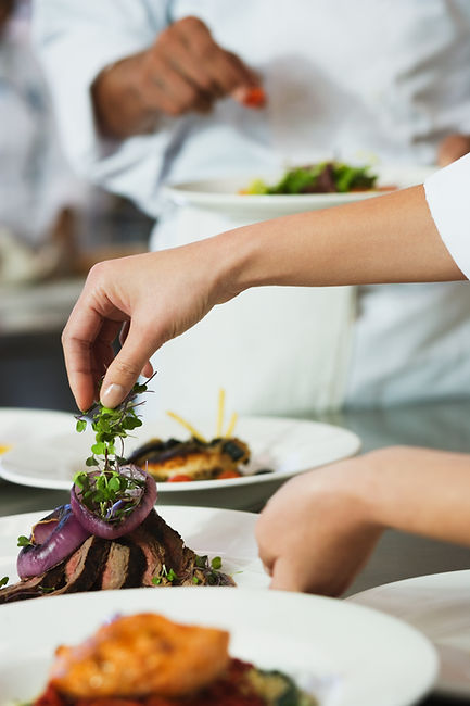 Chef Garnishing a Meal