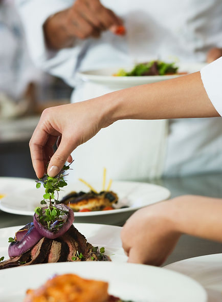 Chef Garnishing a Meal