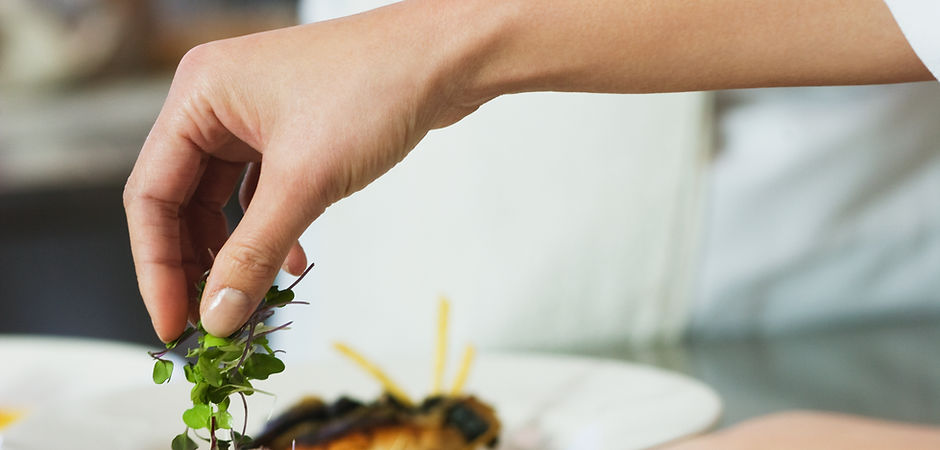 Chef Garnishing a Meal