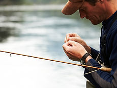 Man tying fishing line