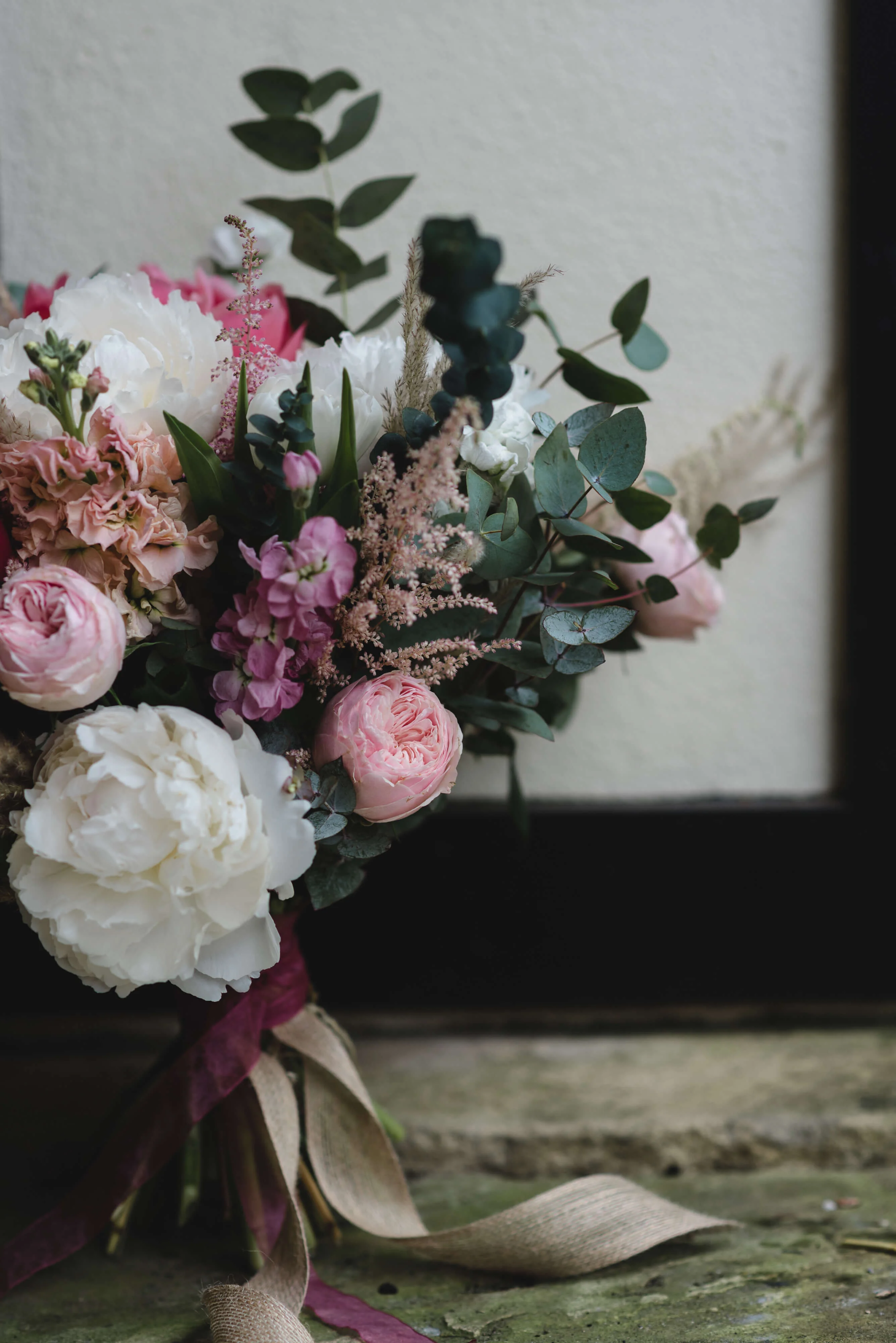 A Bridal bouquet with peonies and roses