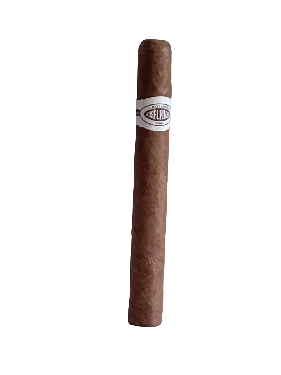 Jose L Piedra Cremas cigar against a black background.