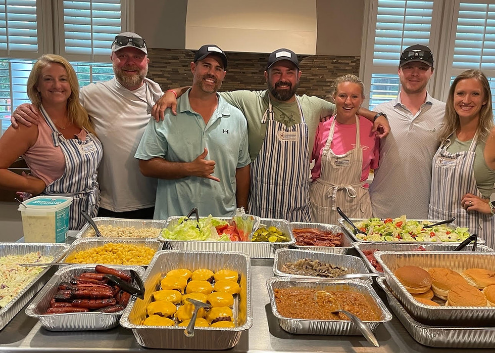 Charleston Real Estate team enjoying a catered buffet meal