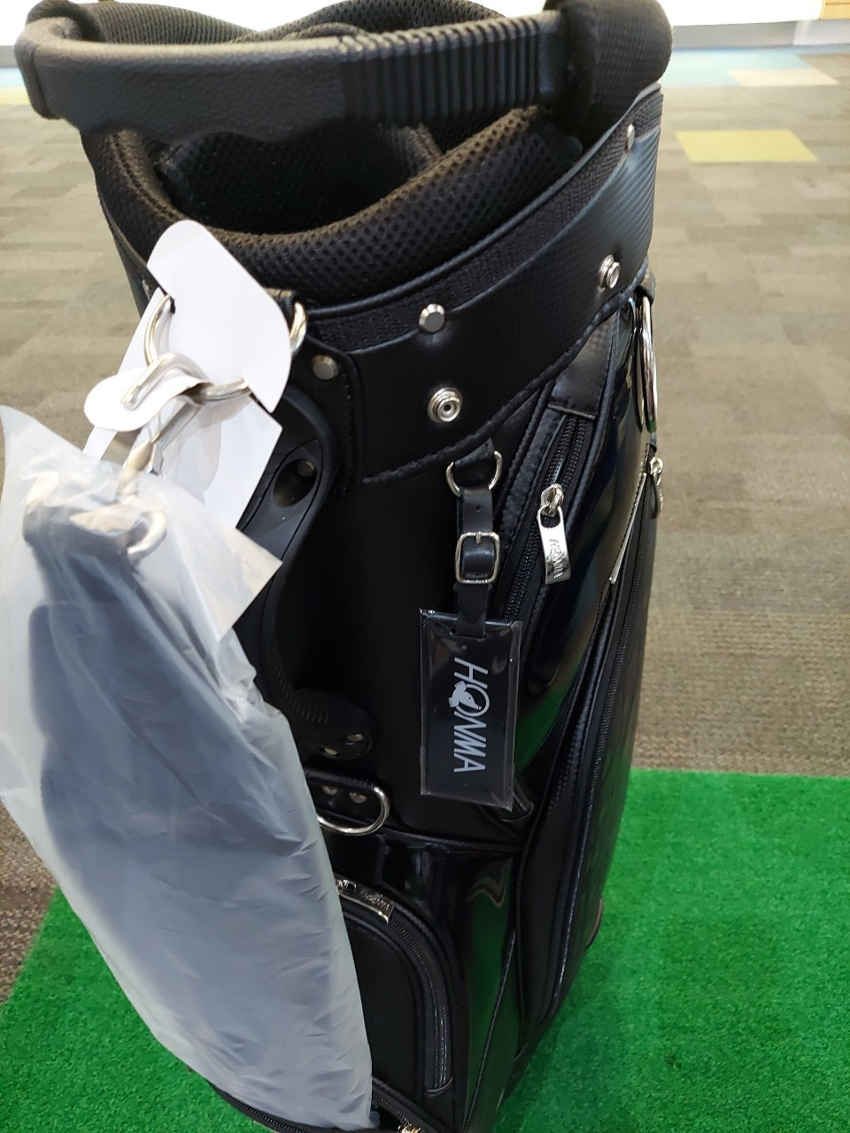 Thumbnail: Black Honma travel cart bag with wheels