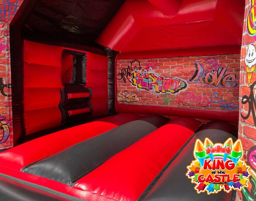 Graffiti Bouncy Castle with Slide Rental throughout Fife: Dunfermline, Glenrothes & Kirkcaldy, plus Kinross, Alloa, Alva and Larbert