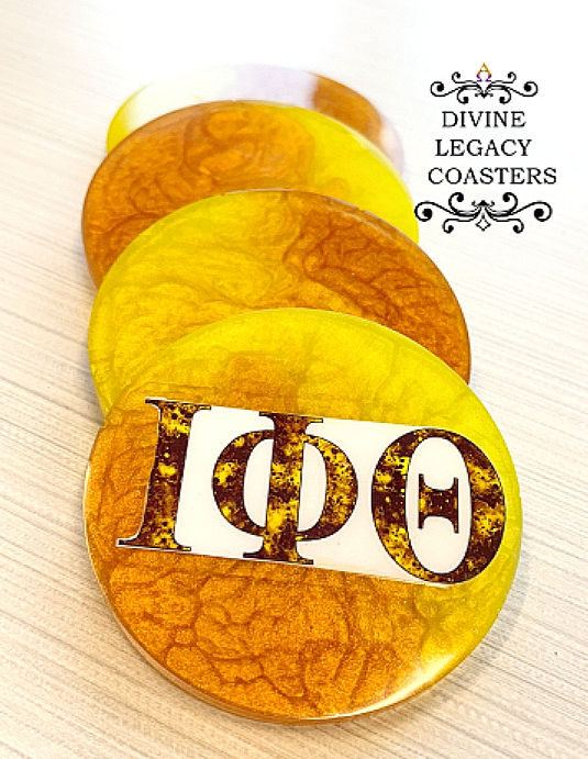 Thumbnail: stacked  brown and gold Iota Phi Theta paraphernalia round resin coasters