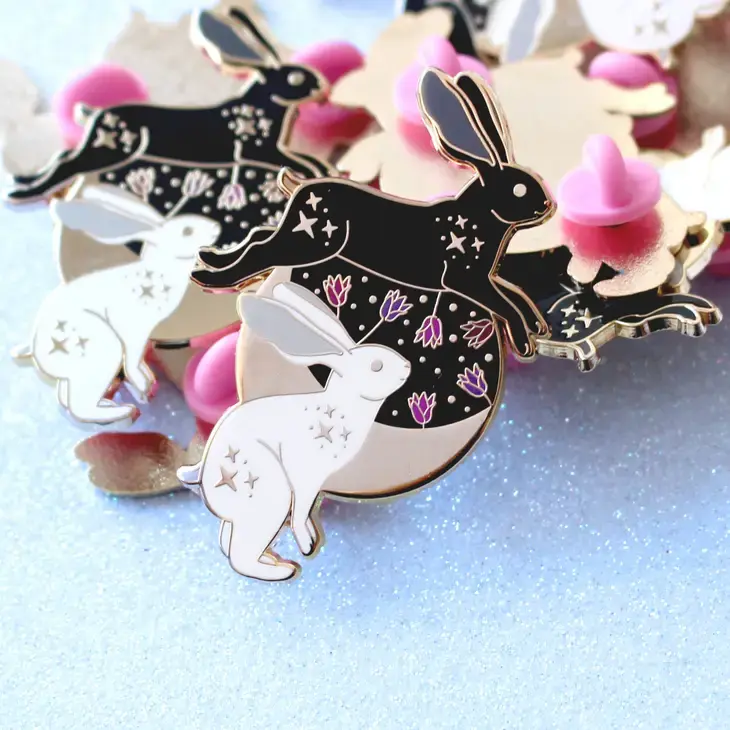 Jumping Hares Enamel Pin