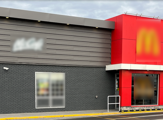 commercial building with uniform brick colour lacking natural variation and depth