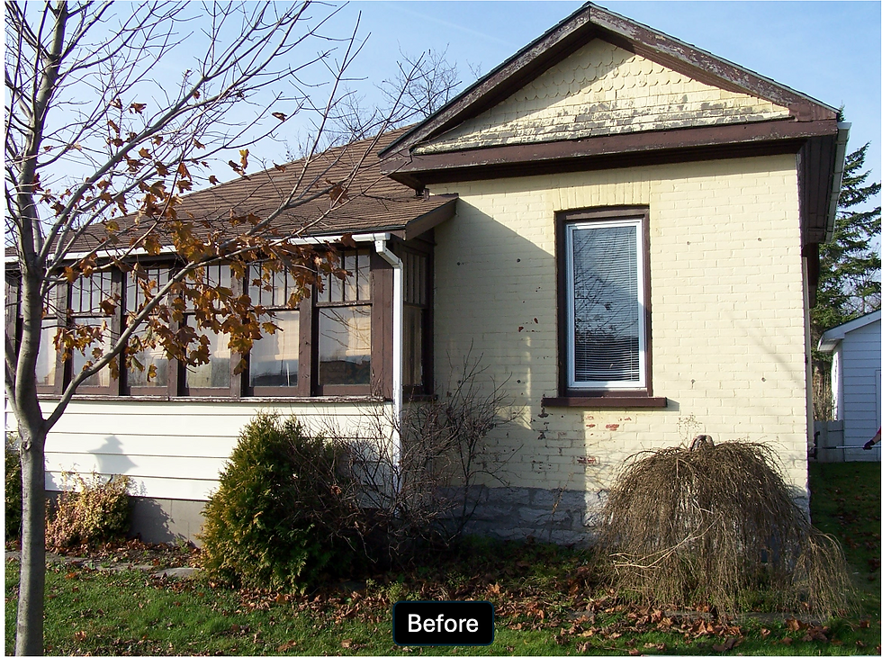 Before picture of painted brick bungalow. Yellow brick.