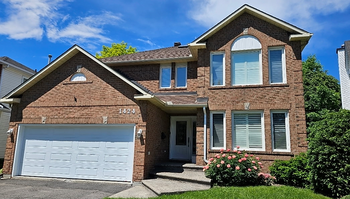 Original unstained brick exterior of Orleans home before professional brick staining