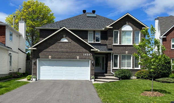 Brick-stained home with realistic colour variation, visible mortar definition, and strong curb appeal, showcasing an authentic brick-and-mortar appearance.