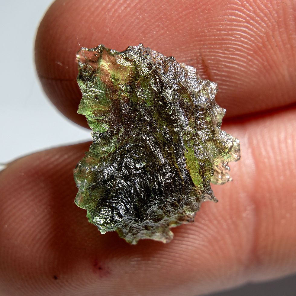 Thumbnail: Rough green moldavite stone