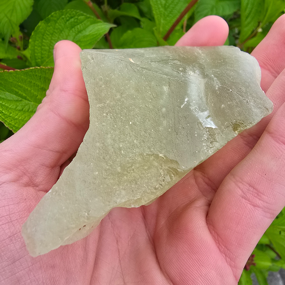 Thumbnail: Libyan Desert Glass held in hand