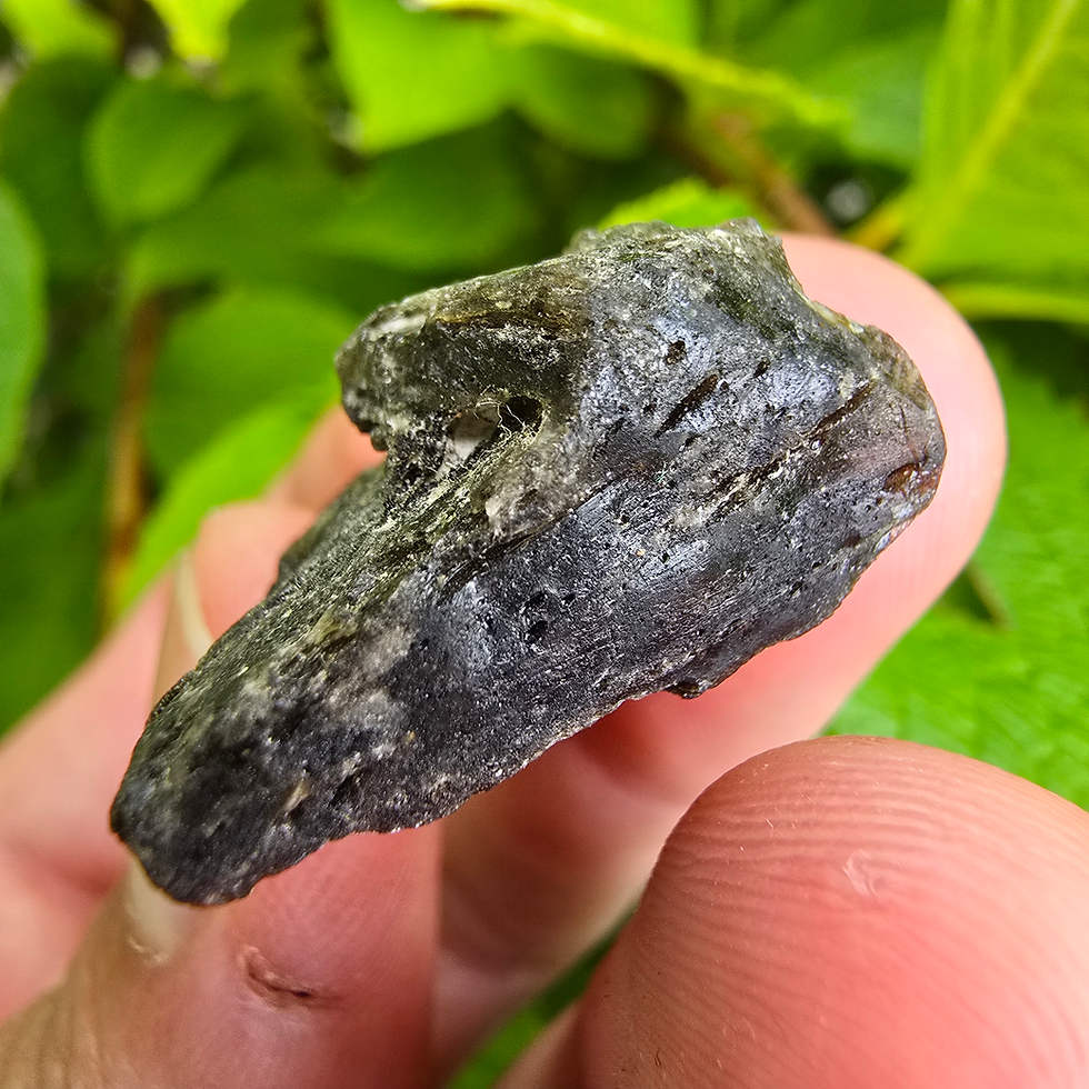 Thumbnail: Textured Moldavite held in hand