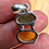 Thumbnail: Moldavite & Amber Pendant