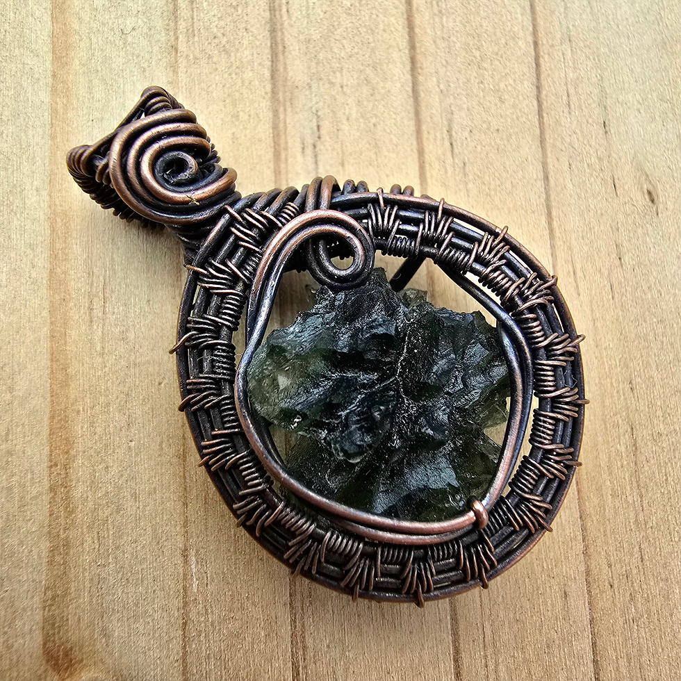 Thumbnail: Moldavite Pendant wrapped in wire