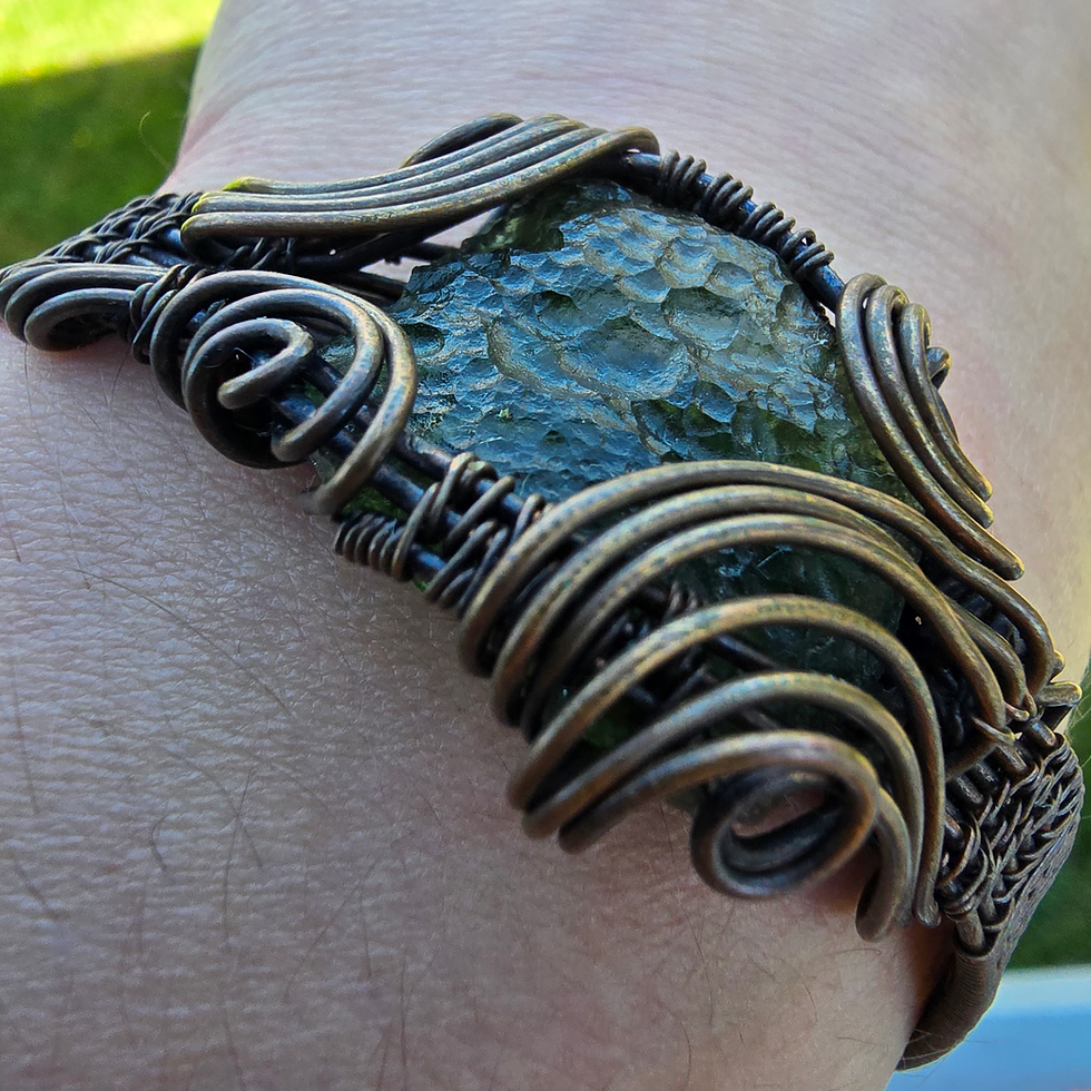 Thumbnail: Wire-wrapped Moldavite bracelet on wrist