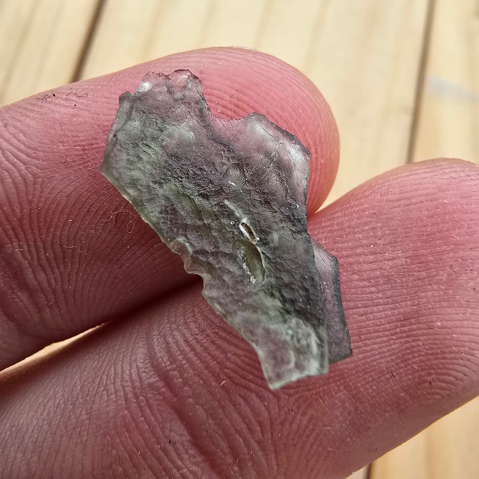 Thumbnail: Philippinite Tektite 40.2g in hand