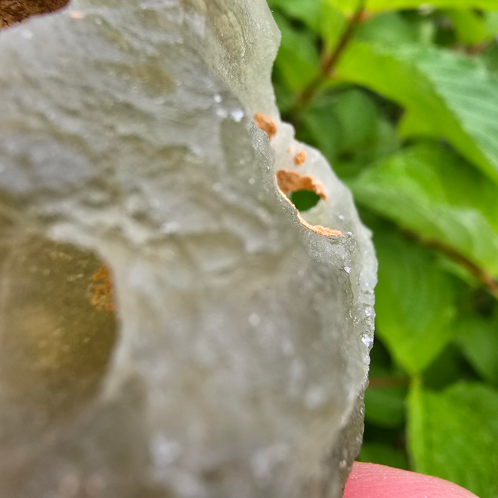 Thumbnail: Translucent green Moldavite with natural texture