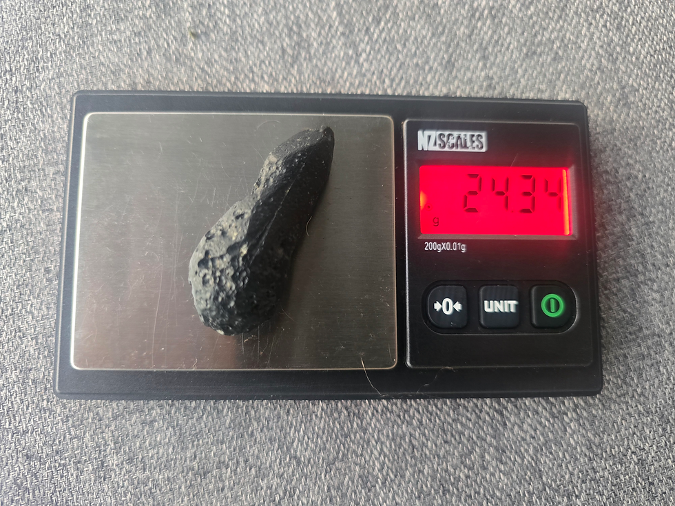 Thumbnail: Moldavite on digital scale, reading 2.43g